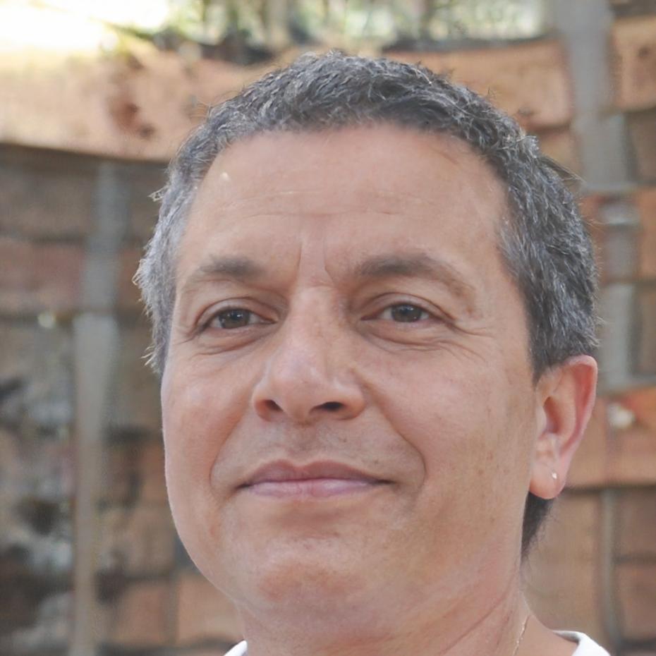 Crisanto Velarde working at desk